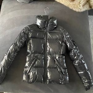 Black Sam. Freestyle down puffer jacket. Sz small. Tiny tear that can be sown.